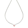Elegant heart necklace in the tennis style featuring a shimmering chain 
adorned with sparkling zircon stones and a heart-shaped charm, available in pink and yellow tones. 