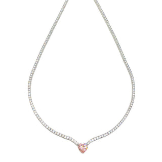 Elegant heart necklace in the tennis style featuring a shimmering chain 
adorned with sparkling zircon stones and a heart-shaped charm, available in pink and yellow tones. 