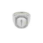 A silver ring featuring a square-shaped center with Arabic lettering surrounded by small clear crystals set in a silver band.