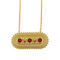 Celestial Ellipse Necklace featuring intricate celestial-inspired patterns, 
available in silver and gold-plating with red, green, white and blue precious gemstones