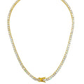 This close-up of a sparkling tennis necklace with shimmering zircon stones, a gold-plated finish, and a sleek 3mm width showcases its radiant elegance and timeless appeal. 
Perfect for both casual and formal occasions, this luxurious piece adds a touch of sophistication to any outfit. 