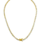 This close-up of a sparkling tennis necklace with shimmering zircon stones, a gold-plated finish, and a sleek 3mm width showcases its radiant elegance and timeless appeal. 
Perfect for both casual and formal occasions, this luxurious piece adds a touch of sophistication to any outfit. 