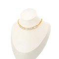 Baguette Bliss Choker Necklace featuring a gold-plated chain adorned with dazzling baguette stones, designed to be the ultimate links necklace. 