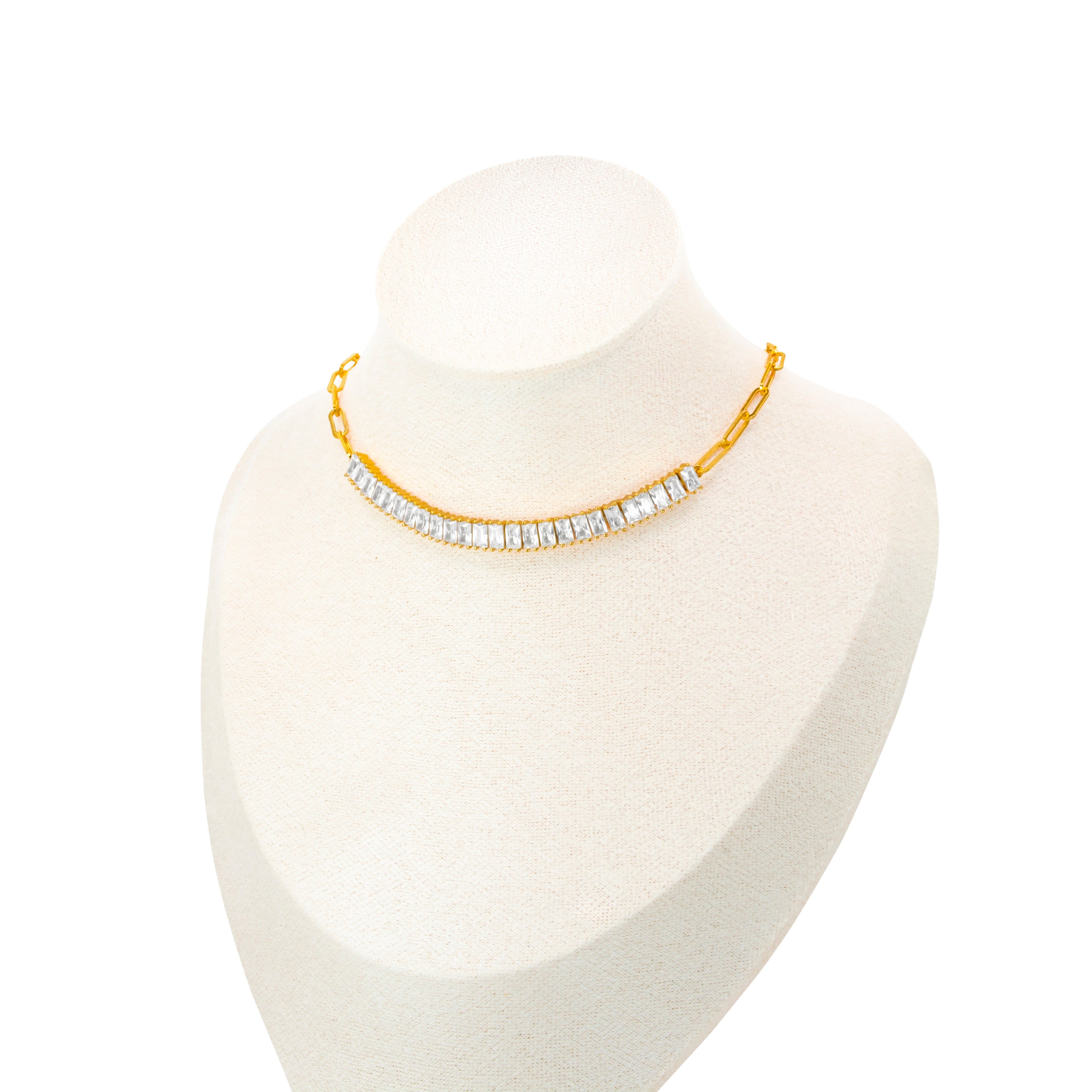 Baguette Bliss Choker Necklace featuring a gold-plated chain adorned with dazzling baguette stones, designed to be the ultimate links necklace. 