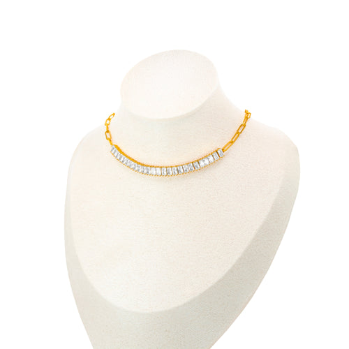 Baguette Bliss Choker Necklace featuring a gold-plated chain adorned with dazzling baguette stones, designed to be the ultimate links necklace. 