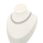 Choker necklace silver by Selsela features a silver necklace adorned with tiny pearl-like beads and elegant paisley-shaped pendants.