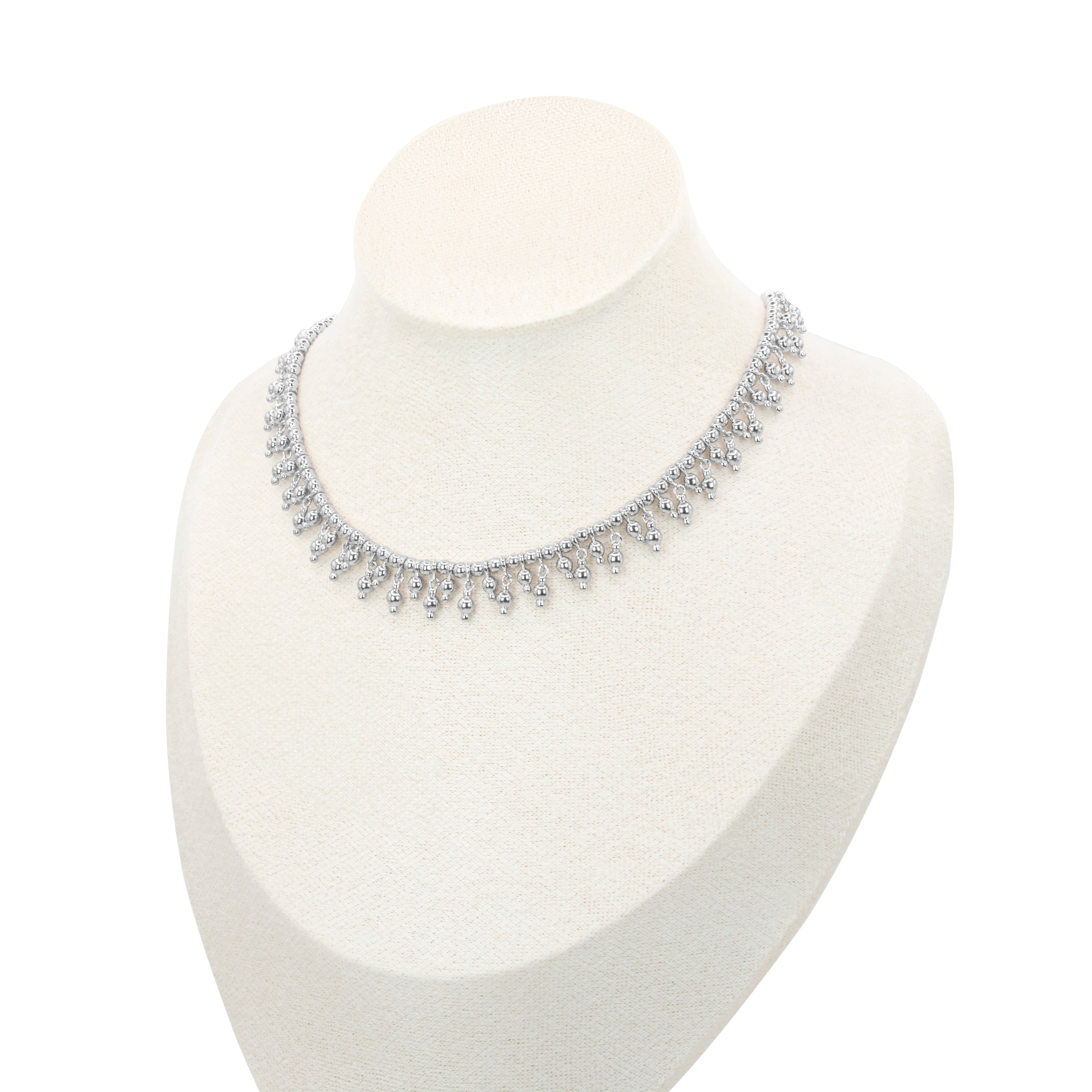 Choker necklace silver by Selsela features a silver necklace adorned with tiny pearl-like beads and elegant paisley-shaped pendants.