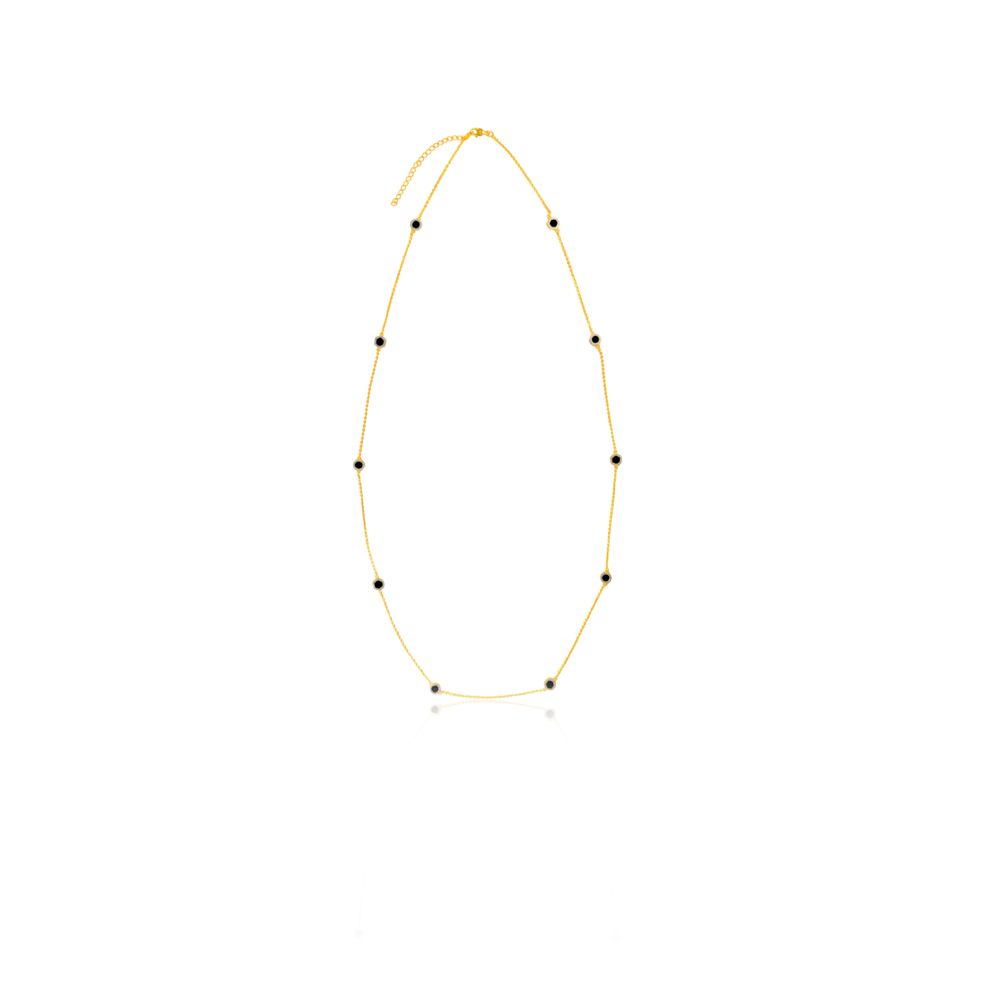 Mesmerizing gold plated chain necklace with small, black, round onyx stones, with variations in malachite, mother of pearl and turquoise.