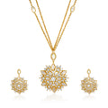 Elegant ﬂower necklace gold plated, featuring a delicate chain and a radiant ﬂower-inspired pendant, ﬂanked by two complementing earrings.